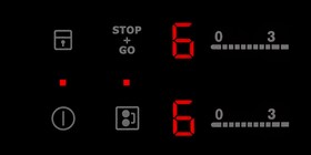 The stop and go button on an Electrolux induction hob