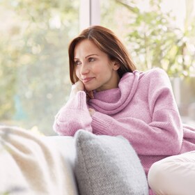 A lady enjoying her wool jumper